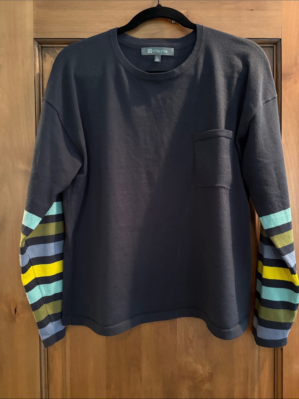Title Nine Men's Navy Crewneck Sweater with Multicolor Striped Sleeves
